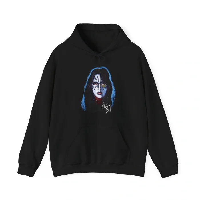 Black hoodie inspired by the Ace Frehley Shirt, featuring an illustrated portrait of a long-haired person with white face paint and black designs, set on a plain background with a stylized signature below the face.