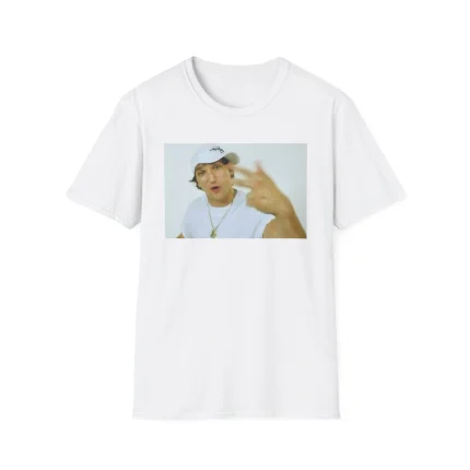 The Alex Ovechkin Rapping Shirt is a white tee with an image of a young man in a white cap, shirt, and gold chain, posing in front of a plain background, and the phrase "God Forbid A White Boy Get A Lil Motion.