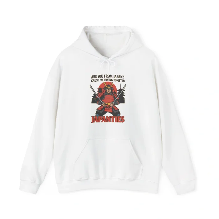 The Are You From Japan Shirt features a cartoon ninja with swords, bold "Are You From Japan?" text above, and playful “JAPANTIES” in large red letters below, all printed on a white hoodie.