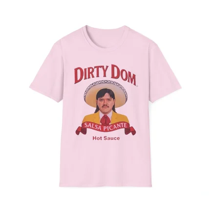 The Dirty Dom Tapatío Shirt is light pink and features a man in a sombrero and yellow suit, with “DIRTY DOM” above and “SALSA PICANTE Hot Sauce” below the illustration.