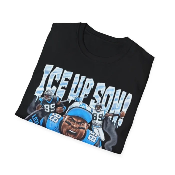 The Ice Up Son Shirt is black and features cartoon football players with the phrase "ICE UP SON!" in large, icy letters. Bold, colorful graphics stand out with light blue and white accents.