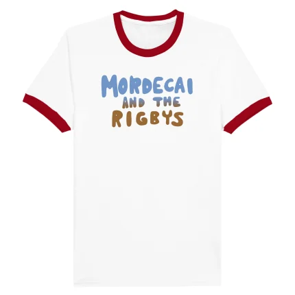 The Mordecai and the Rigbys Shirt is a white tee with a red collar and sleeve edges. "MORDECAI AND THE RIGBYS" is printed on the chest in playful blue and brown rounded letters.