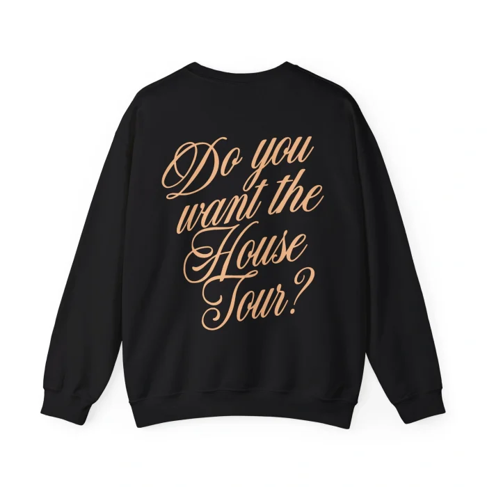 The Sabrina Carpenter House Tour Shirt is a black sweatshirt featuring "Do you want the House Tour?" in large, elegant beige script on the back.