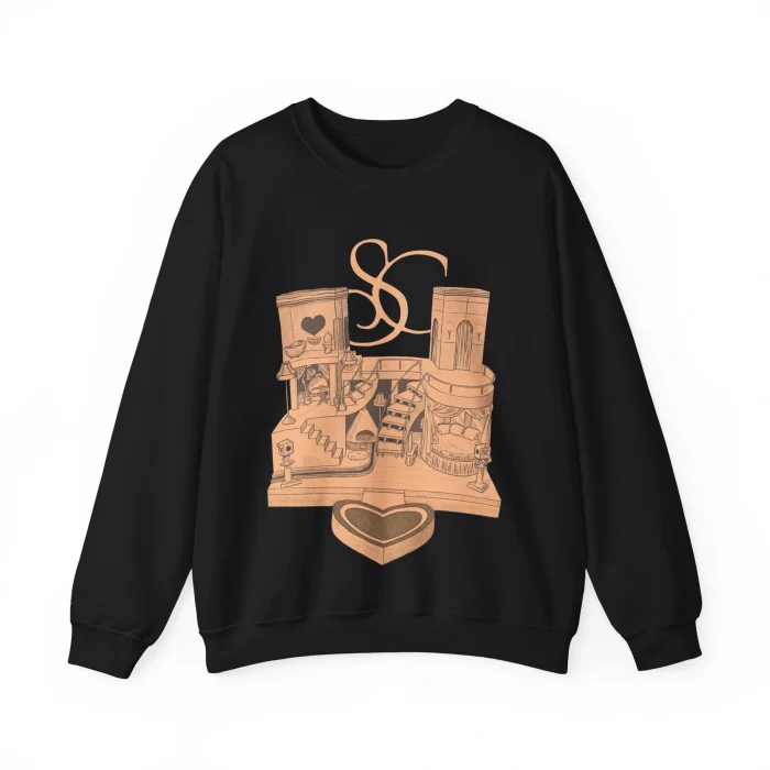 The Sabrina Carpenter House Tour Shirt is a black sweatshirt with a tan graphic of paint cans, brushes, a staircase, and a heart-shaped box. Above the design are stylized intertwined SC letters.