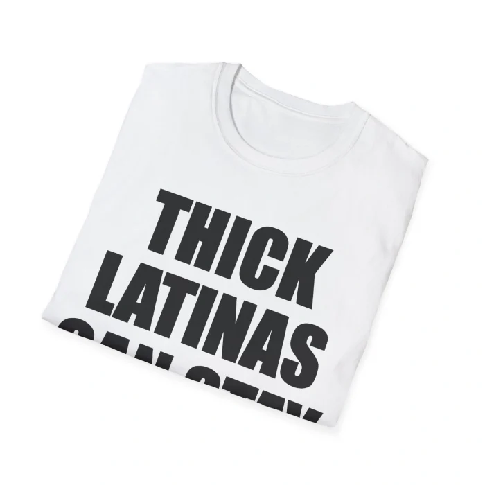A folded white Thick Latinas Can Stay Shirt featuring bold black text that says "THICK LATINAS" across the front, displayed on a plain white background.