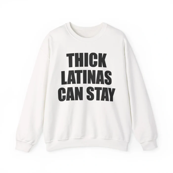 The Thick Latinas Can Stay Shirt is a white crewneck sweatshirt featuring bold black text on the front that says, "THICK LATINAS CAN STAY.