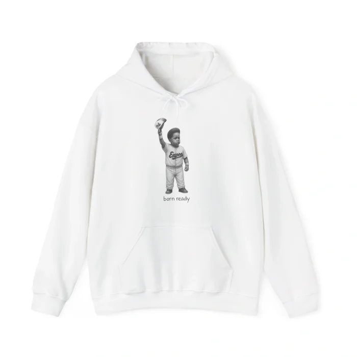 White hoodie with front pocket, featuring a black-and-white graphic of a young child in sportswear holding a ball overhead. Inspired by the Vladimir Guerrero Jr. Born Ready Shirt, "born ready" text is printed below the image.