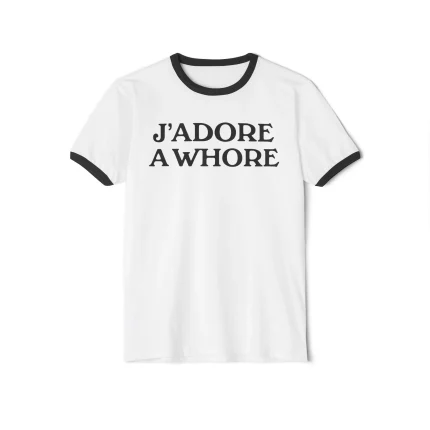 The J'adore a Whore Shirt is a white tee featuring black trim on the collar and sleeves, with "JADORE A WHORE" printed in bold black capital letters across the front.
