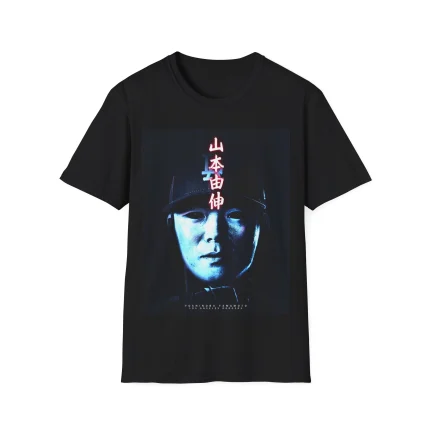Black Yoshinobu Yamamoto MVP Shirt featuring a dramatic portrait with bold red Japanese text above and below. The design stands out against a dark background, celebrating the player’s MVP achievement.