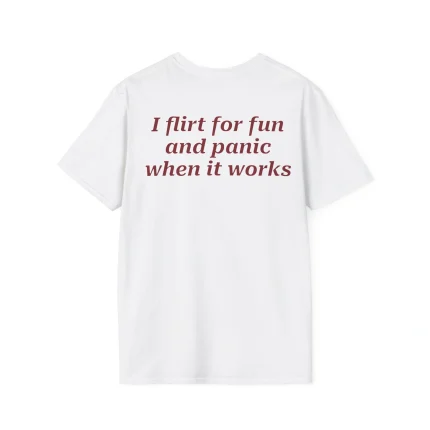 The I Flirt For Fun And Panic When It Works Shirt is a white tee with bold maroon text on the back—ideal for anyone who enjoys playful style and a touch of humor.