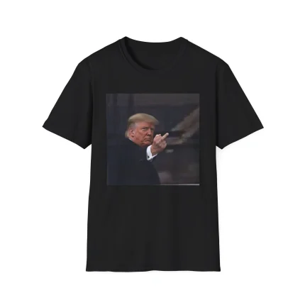 The Trump Middle Finger Shirt is a black tee featuring an image of a suited man resembling Donald Trump flipping the middle finger—ideal for fans wanting a bold, statement-making look like the iconic Luke Kornet Shirt.