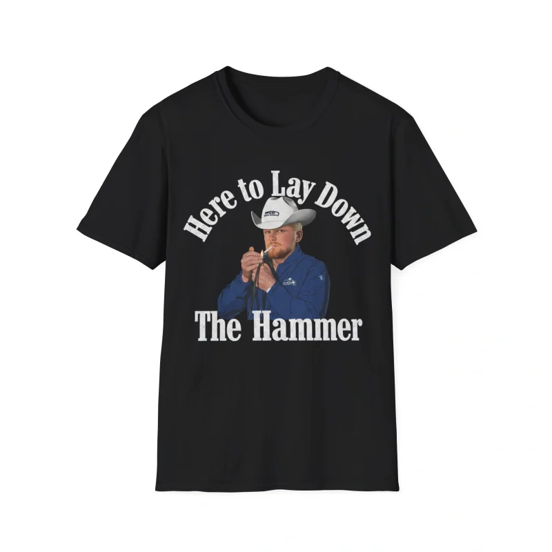 The Here To Lay Down The Hammer Shirt is a black tee with bold white text and a graphic of a man in a cowboy hat holding a tool, ideal for fans of the Sam Darnold Middle Finger Shirt style.