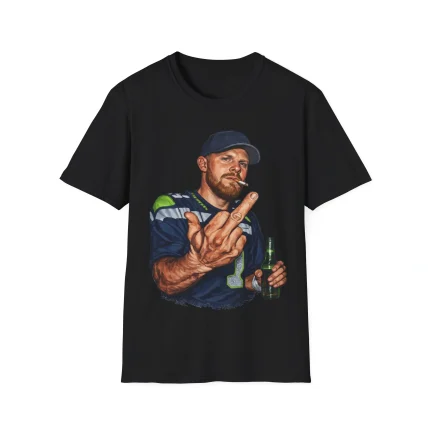 The Sam Darnold Middle Finger Shirt is a black tee featuring a bold illustration of a man in a cap and jersey, beer in hand, raising his middle finger defiantly.